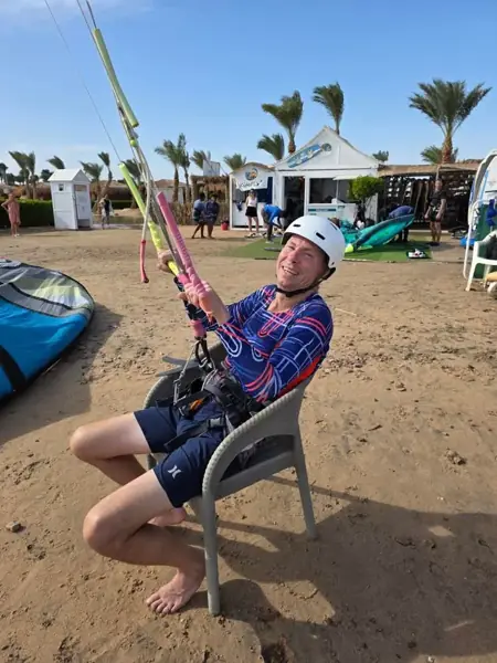 Guest enjoying a kite lesson at the school