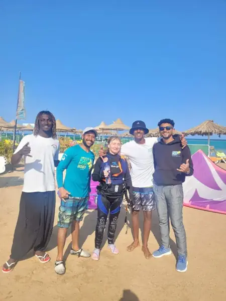 Guest with the instructors after a lesson